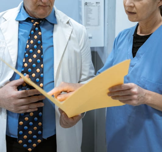 Healthcare revenue recovery specialists reviewing denied and underpaid medical claims Healthcare revenue recovery specialists reviewing denied and underpaid medical claims